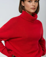 Red oversized turtleneck sweater with high roll neck, front view