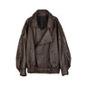 Detail shot of ribbed cuffs and hem trim on a leather bomber jacket
