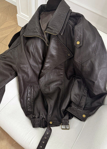 Back view of an oversized leather bomber jacket with structured seams