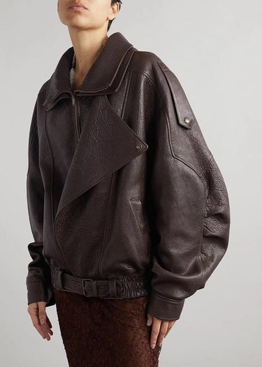 Front view of an oversized leather bomber jacket with wide collar and asymmetric zip