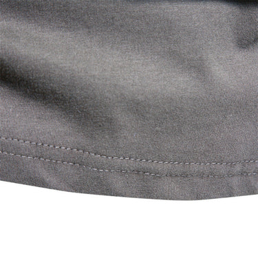 Folded long sleeve crew neck top showing the plain fabric and stitching