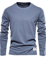 Side view showing the straight hem and long sleeves