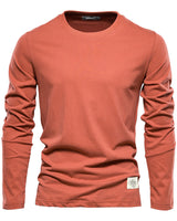 Full-length front view of the long sleeve top on a model
