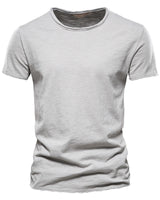 Close-up of the round neckline with narrow stitched trim