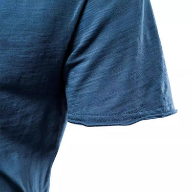 Close-up of the chest area showing the plain fabric and V-neck finish