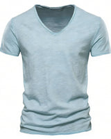 Close-up of the V-neckline with narrow trim detail