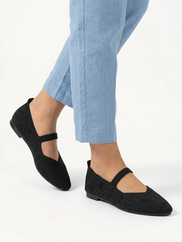Close-up of pointed toe and knit texture on Mary Jane flat