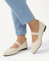 Detail of elastic instep strap on Mary Jane ballet flat