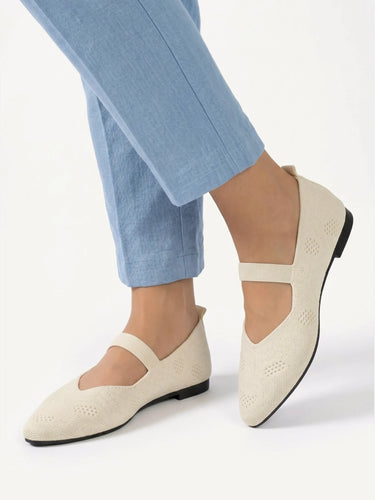 Detail of elastic instep strap on Mary Jane ballet flat