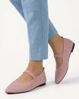 Pair of Mary Jane flats displayed from above