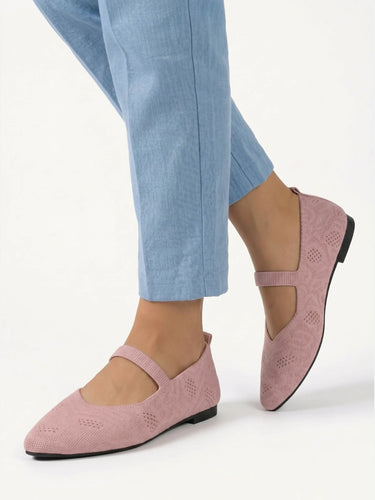 Pair of Mary Jane flats displayed from above