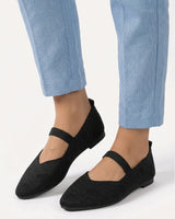 Ballet flat styled with tailored trousers, three-quarter view