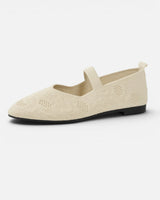 Pointed-toe Mary Jane ballet flat with open-knit upper and elastic strap, side view