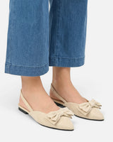Front view of pointed toe ballet flat with decorative bow