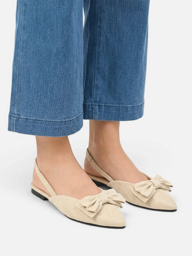 Front view of pointed toe ballet flat with decorative bow