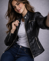 Ribbed quilted panel detail on the upper arm of a leather jacket
