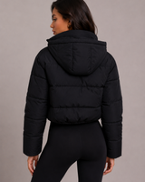 Close-up of the quilted panelling and zip fastening on the puffer jacket