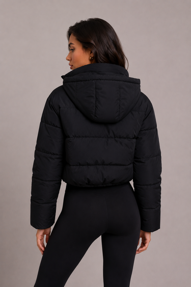 Close-up of the quilted panelling and zip fastening on the puffer jacket