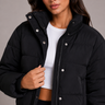 Rear view of the hooded cropped puffer jacket showing hood and back panel