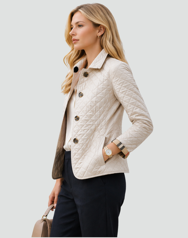 Three-quarter view of the quilted jacket showing collar and stitching