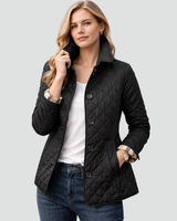 Front view of a quilted puffer jacket with button front and diamond stitching
