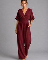 Back view of the wide-leg denim jumpsuit