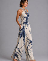 Side view showing the relaxed wide-leg silhouette and linen blend fabric drape