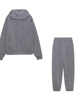 Flat lay of the two-piece set showing hoodie and joggers together