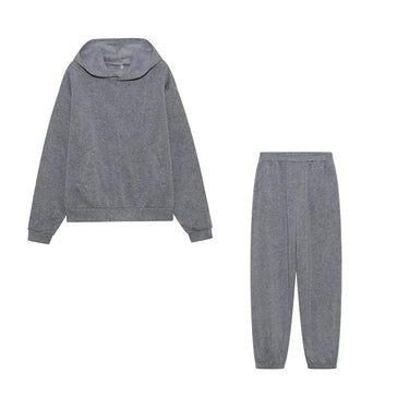 Flat lay of the two-piece set showing hoodie and joggers together