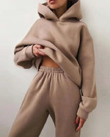 Front view of a matching hoodie and jogger set with oversized hood