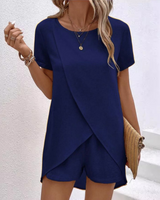 Detail shot of the neckline and hem of the lounge top