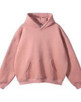 Model wearing the pullover hoodie in a casual setting