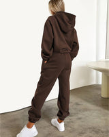 Side view of the jogging set, highlighting the straight silhouette of the trousers