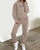 Close-up of the top's neckline and fabric finish on the two-piece jogging set