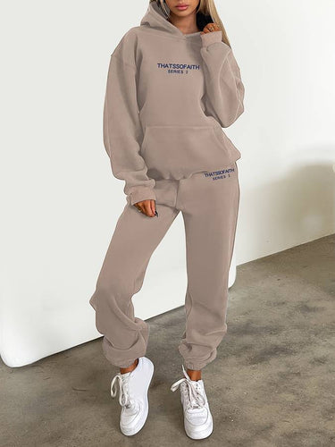 Close-up of the top's neckline and fabric finish on the two-piece jogging set