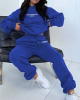 Full-length shot of the jogging set worn in brown, showing overall proportions