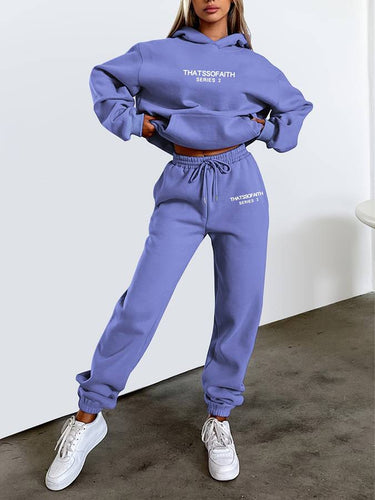Women's jogging set shown in blue, front-facing full-length view