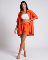 Flat lay of the matching top and shorts side by side