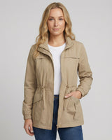 Front view of a relaxed utility jacket with stand collar and drawstring waist