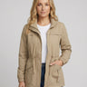 Front view of a relaxed utility jacket with stand collar and drawstring waist