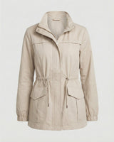 Model wearing the utility jacket with flap pockets visible