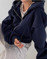 Close-up of the full-length zip closure and hood drawstring detail