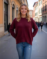 Close-up of the ribbed round neckline on a knitted sweater