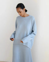 Close-up of the fabric texture on a knitted oversized sweater