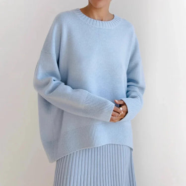 Front view of an oversized round neck sweater in black with long sleeves
