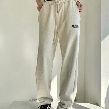 Full-length back view of the grey sweatshirt and jogger co-ord set