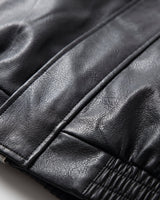 Close-up of lapel collar and zip fastening on men's faux leather jacket