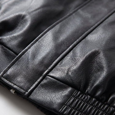 Close-up of lapel collar and zip fastening on men's faux leather jacket