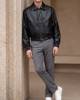 Men's relaxed-fit faux leather jacket with lapel collar and zip fastening, front view
