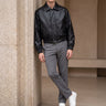 Men's relaxed-fit faux leather jacket with lapel collar and zip fastening, front view